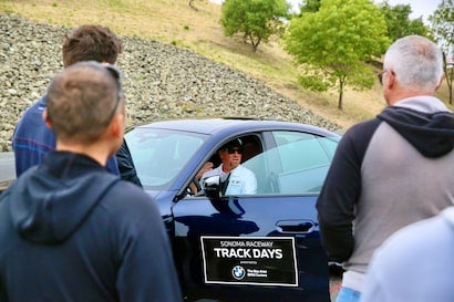 track day at sonoma men surrounding bmw